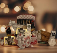 Load image into Gallery viewer, Looking for the perfect holiday gift to impress? Our Festive Holiday Gift Box is a stunning, reusable flip-top box wrapped in holiday cheer with its elegant red and silver snowflake design, perfect for cherishing year after year!
We've selected: A beautiful handmade charcuterie board, a bottle of red or white wine, creamy Brie cheese, water crackers, a box of indulgent Ferrero chocolates, or a selection of chocolates, savory sausage stick, a full set of cheese knives and cutlery, a bottle opener,
