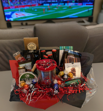 Load image into Gallery viewer, Introducing our "Sports-Themed Gift Baskets" A Home Run for super fans! Get your special someone game day ready!
Get ready to tackle game day with this tailgating treasure! We've stuffed it with sweet, savory, and sporty surprises. Beer can be delivered locally ONLY!  For those shipping this amazing gift we will load up on extra snacks! Please select in the drop-down which gift you prefer.