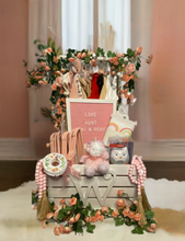 Load image into Gallery viewer, At Perfect Selection Creative Gifts, we're thrilled to unveil one of our cutest creations the custom baby shower crate! Imagine gifting the soon-to-be parents with a beautifully curated collection of baby essentials, all nestled within a charming wooden crate transformed into an adorable mini closet.
Inside this delightful baby crate, you'll discover a treasure trove of carefully selected goodies, including adorable baby outfits that are handpicked for their style and comfort, sweet cuddly toys