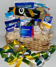 Load image into Gallery viewer, savory sausage, and gourmet crackers. Got a sweet tooth? No problem! We've included chocolate-covered caramels, cashew Roca, chocolate caramel cookies, and so much more.
And for the ultimate touch? A Green Bay Packers water bottle to cheer on his favorite team, all wrapped up with a festive bow and a cheeky birthday card that’s sure to keep the laughs coming.
This basket is the perfect blend of sweet, savory, and side-splitting humor, making it a birthday to remember for your boss who truly deserves