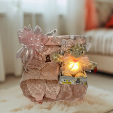 Load image into Gallery viewer, Welcome the Newest Little One with Elegance and Charm! Celebrate the arrival of a beautiful baby girl with this delightful gift set, thoughtfully arranged in a luxurious velvety-touch flip-top box. Inside, you’ll find: A plush, gorgeous coral throw to keep her cozy and warm, a matching& adorable outfit in size 6-9 months, complete with a matching headband for a picture-perfect look.
A soothing Dream Gro Light and Lullaby Soother are ideal for creating a calming and serene environment