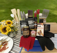 Load image into Gallery viewer, BBQ Cooler Grilling Gift Set ~ "A Legendary BBQ Experience"
Fire up the grill with our ultimate BBQ Cooler! Packed in a stylish, Igloo-wheeled cooler (14″ x 12″ x 22″), this gift is loaded with essentials for the grill master in your life.