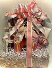 Load image into Gallery viewer, Don't forget the man of the party. We are stock-loaded with awesome gifts for him, too! We have a large selection of boxes and crates filled with bath and body products, etched glasses, wallets, spirits of choice, and so many cool things to make his day just as special as his Birde to Be!