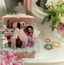 Load image into Gallery viewer, This bride loves the color pink but we can customize your gift by color, size, and contents. Feel free to chat with us online or reach out to us! (The base price starts at $75.00 for this gift.) (Please note we do not ship adult beverages but we can substitute for other items.) Your gift will come wrapped in a cello with a notecard and a beautifully handmade bow! What says Happy Wedding Day... and showing your love for the bride like this amazing, well-put-together gift!