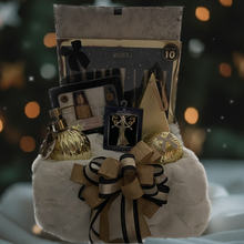 Load image into Gallery viewer, Treat someone special to the luxurious "Golden Elegance Gift Box", a stunning blend of beauty, comfort, and holiday cheer. Presented in a reusable black-and-white floral flip-top box, this gift is as stylish as it is thoughtful.