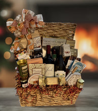 Load image into Gallery viewer, Indulge in unparalleled culinary delights with our exquisite Extra Large Gourmet Gift Basket, a paragon of refined taste and opulence. "Our All-Time Favorite" ensemble is a veritable cornucopia of lavish gourmet treasures, tailored to delight the discerning palate of the esteemed gourmand in your life. An offering so meticulously curated, it promises to be a gift that keeps on giving, a source of shared enjoyment for the entire family.