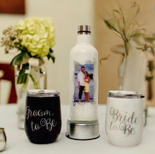 Load image into Gallery viewer, Introducing "Bride & Groom To Be" - the epitome of love, personalized to perfection! This stainless steel set of stemless wine glasses and a bottle is more than a vessel; it's a love-filled chalice that keeps your favorite wine at just the right temperature, embracing the flavors for hours.