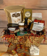 Load image into Gallery viewer, Elegantly presented in a cello wrap and adorned with a heartfelt notecard and an exquisite handmade bow, this gift epitomizes the Southern spirit, wrapped in love and culinary finesse. With seasonal variations, we may surprise you with products of equal or greater value, ensuring an exceptional and delightful experience. Let us craft the perfect heartwarming gift to convey your love to that special someone.
