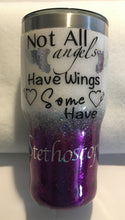 Load image into Gallery viewer, "Not All Angels Have Wings some have Stethoscopes"... This 30-ounce stainless steel tumbler is decorated with super fine metallic glitter, vinyl and metallic vinyl, and resin. This tumbler is great for any hot or cold drink and can hold 30 fluid ounces with a lid. These tumblers can be ready in one to two weeks. We can personalize and customize these tumblers by adding names, dates, etc. We carry several different stainless tumblers in a variety of sizes.