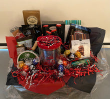 Load image into Gallery viewer, It's got everything: a great reusable basket, your team sports cup (please add a team in the notes along with your card), crisps, peanuts, cheese straws, cheese, cookies, pretzels, mustard, chocolate-covered almonds, and more for your days of FUN! Allow us to make your fan his/her favorite gift!
We'll wrap it in shrink wrap, add a notecard, and top it off with a handmade bow in a matching color. Just give us your favorite team, and we will do all the legwork and matching of colors.