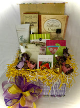 Load image into Gallery viewer, Open the box of wonders and find a paradise of pampering! Bath & Body delights, a symphony of Body Cream and Body Wash, accompanied by an exfoliating bath sponge - a celebration of self-care! But wait, there's more - a gourmet selection awaits! Wine & Cheese Crackers, the dance of Cheese, the crunch of Flatbread Crisps, the sweetness of Cookies, and the magic of Cosmo/Margarita drink mix - a true feast for the senses or select your drink in the drop-down!