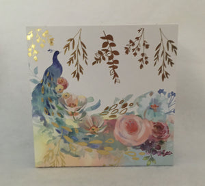 This is a water colored painted box with a peacock and flowers very pretty!