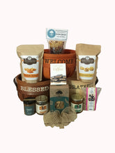Load image into Gallery viewer, Indulge in an array of delightful treats, carefully chosen to embody the essence of Southern love. From gourmet popcorn and savory pretzels to soul-soothing soups and delectable honey, our baskets overflow with Southern flavors that delight the taste buds. And that's just the beginning - we offer an exquisite assortment of snack mixes, dips, toffees, chocolates, and more to satisfy every craving.