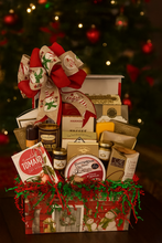 Load image into Gallery viewer, Our enchanting “Snowman’s Keepsake Delight” comes nestled in a reusable flip-top box, perfect for holiday celebrations and lasting memories. Inside, you’ll find Dolcetto Cracker Crisps, Caramel Popcorn, Butter Toffee Pretzels, Old Fashioned Chocolate Salted Caramel Cookies, a hearty Beef Stick, and Chocolate Rolled Wafers.

The assortment continues with Hammond Toffee Peanuts, a Cheddar Cheese Stick, two Hot Cocoas, Vineyard Estates Cheese Straws, and Chocolate Covered Caramels.