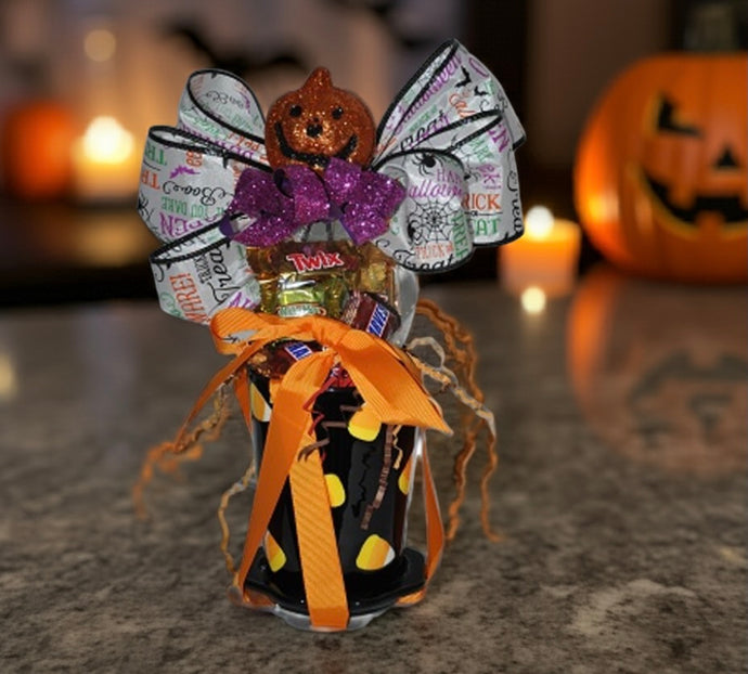 Calling all Halloween and fall fanatics! Our “Mugs Galore with Candy and More” collection is a fun and festive way to celebrate the season. Each mug or cup is filled to the brim with delicious candy or hot cocoa and treats, then wrapped in shrink wrap and topped with a beautiful handmade bow.