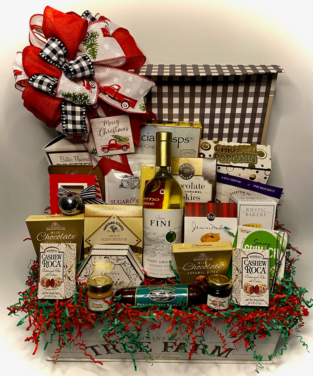 Elevate Your Gifting Experience with Our Signature Christmas Gourmet Gift Basket! ✨🎁  This holiday season, elevate your gifting game with our stunning reusable flip-top box, thoughtfully curated to delight both the discerning gourmand and the festive aficionado! Overflowing with an enticing medley of sweet and savory treats, our exclusive collection is the epitome of culinary craftsmanship, meticulously designed to bring joy to families, offices, and gracious hosts or hostesses.