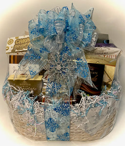 This Winter Snowflake Gourmet Gift Basket transcends mere culinary offerings; it represents an exquisite mix of flavors and sophistication, ideal for adding a touch of distinction to your winter festivities or as a thoughtful gesture to mark the season's spirit.  Whether shared among friends during intimate gatherings or presented as a token of appreciation, our meticulously curated gift basket promises to elevate every moment with its refined selection and seasonal charm.