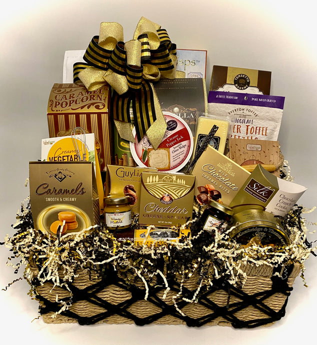 This extraordinary gift basket is not just a collection of treats; it's a celebration wrapped in cello, adorned with a beautifully handcrafted bow, and accompanied by a personalized notecard. Ideal for any occasion, it's a perfect gesture to share joy, and gratitude, or simply savor life's special moments. from the crunch of focaccia crackers to the sweetness of caramel popcorn and butterscotch caramels.