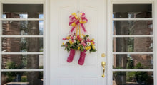 Load image into Gallery viewer, Each wreath is carefully handcrafted to ensure a one-of-a-kind design filled with color, texture, and seasonal charm. We will select seasonal silks unless you would like to customize with other.

Display Ideas:
✔ Front door
✔ Porch or patio
✔ Indoor wall or table décor
✔ Baby shower or nursery accent

Bring the beauty of spring into your home with this delightful floral rain boots wreath — a sweet and stylish seasonal favorite. 