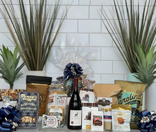 Load image into Gallery viewer, We’re incredibly proud to once again have created beautiful gift baskets for CIT Financial for their High Point Market event! It’s always an honor to be trusted for multiple seasons now, and we’re so grateful for the continued partnership and confidence in our work. Each order has been a joy to design, and we’re truly grateful for their continued trust in us. For this special occasion, we went with one of our favorites, an NC-themed gift basket filled with local goodies that celebrate.