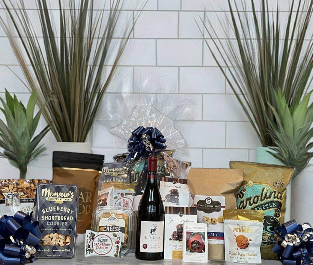 We’re incredibly proud to once again have created beautiful gift baskets for CIT Financial for their High Point Market event! It’s always an honor to be trusted for multiple seasons now, and we’re so grateful for the continued partnership and confidence in our work. Each order has been a joy to design, and we’re truly grateful for their continued trust in us. For this special occasion, we went with one of our favorites, an NC-themed gift basket filled with local goodies that celebrate.