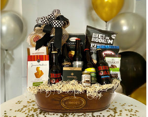 This Ultimate beer drinkers gift basket is "All the Rage!" curated in a reusable container that measures 18" x 9" X 6".&nbsp; We have included a variety of six different North Carolina beers and delicious treats and snacks, this gift is a party in itself! Perfect for Birthdays, Father's Day, Mother's Day, Grandparents Day, New Dad &amp; Mom, Bosses Day, or just for that beer lover.