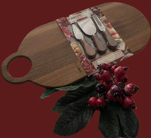 Our "Cheerful Charcuterie Board" has a rounded handle and this board comes with 2 cheese knives and a fork to complete this 19.5" x 8.5" x 1/2" board.

This elegant gift includes:

A bottle of wine.
A creamy Brie cheese spread.
Crisp water crackers.
A savory sausage stick.
Decadent Cashew Roca, and more.
It’s ideal for celebrations, gifting, or to indulge in some fun!