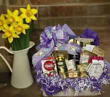 Load image into Gallery viewer, Make your holiday gifting unforgettable with our "Grateful Holiday Basket" has a perfect blend of gratitude and indulgence. Thoughtfully curated, it features delicious sweet and savory items such as creamy cheeses, wine biscuits, pretzels, water crackers, caramel popcorn, savory meats, dip mixes, cookies, chocolates, toffee pretzels, premium coffee, mustards, jellies, and so much more!

This is our beautifully designed Easter basket with pretty pastel colors. 