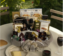 Load image into Gallery viewer, Introducing the epitome of gourmet indulgence: &quot;Mangia Gourmet Italian Gift Basket.&quot; This sophisticated selection is #1 Realtor&#39;s top choice seeking a truly memorable gift. Inside, you&#39;ll discover an array of Italian delights, including Two Regular Size Kitchen Towels, a Spoon Rest or Trivet, Two Artisan Pastas, Olives, Crisps, Salami Stick, Vegetable Dip, Cookies, Pesto Sauce, Biscotti, Pretzels, Cheese, and an exquisite assortment of luxury chocolates, and so much more.