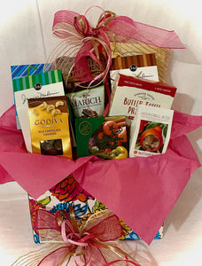 Flower Box of Treats! This gift box measures 11" x 6" x 7.5" and is full of treats to say Thank you, a business gift, a realtor gift, a great gift for a new mother-to-be, Mother's Day, nana, Grandparents Day, Father's day, or that special someone you want to send an enjoyable treat to. It includes caramel popcorn, Mojito drink mix (you can add seltzer or spirits) coffee, tea, or hot cocoa, cheese straws, or crackers, cookies, chocolate-covered almonds, butter toffee pretzels,