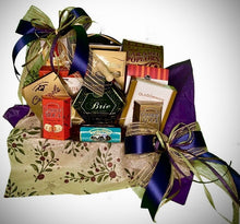 Load image into Gallery viewer, Look no further for the perfect thank-you gift! Our Many Thanks Market Tray shows your appreciation to a client, employee, boss, business partner, host/hostess, or someone you want to show gratitude to! We designed this market tray with purple and Tuscan-themed tissue paper. This sweet and savory fare of gourmet delights begins with a fine assortment of crackers, select cheese, cheese spreaders, meat sticks, toffee nuts, chocolate wafers, butter pretzels, chocolates, caramels, cookies, and so much more!