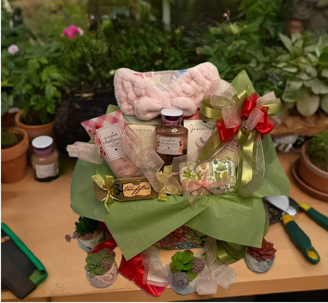 We're excited to introduce you to our Succulent Garden Basket! 

Imagine unboxing a treasure trove of delights carefully curated to elevate any occasion. From birthdays to bridal showers, Mother's Day or to say thank you this basket is the epitome of versatility, making it the perfect choice for that special someone in your life.

Indulge your senses with every luxurious detail. Wrap yourself in the softness of a cozy headband and revel in the lather of our Bath and Body shower gel. 