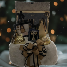 Load image into Gallery viewer, Treat someone special to the luxurious &quot;Golden Elegance Gift Box&quot;, a stunning blend of beauty, comfort, and holiday cheer. Presented in a reusable black-and-white floral flip-top box, this gift is as stylish as it is thoughtful.