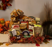 Load image into Gallery viewer, Make your holiday gifting unforgettable with our &quot;Grateful Holiday Basket&quot; —a perfect blend of gratitude and indulgence. Thoughtfully curated, it features creamy cheeses, wine biscuits, pretzels, water crackers, caramel popcorn, savory meats, dip mixes, cookies, chocolates, toffee pretzels, premium coffee, mustards, jellies, and so much more.