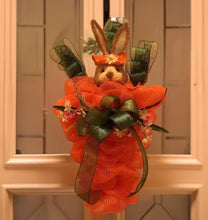 Load image into Gallery viewer, Say &quot;Hello and Welcome!&quot; to spring with our adorable &quot;Spring Bunny Decor!&quot; It is crafted with love using vibrant orange and green mesh ribbon, adorned with silks, and featuring a bunny rocking a fabulous handmade bow. This 34 &quot;x 22&quot; gem is perfect for any door or wall and will put a smile on all your favorite bunnies&#39; faces! Whether for your front door, wall, or school door, these vibrant and festive colors. Welcome All!