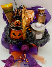 Load image into Gallery viewer, Introducing our &quot;Cozy Pumpkin Retreat Gift Basket&quot;, a curated collection of autumn delights designed to indulge the senses. A charming pumpkin-themed mug, festive cocktail napkins, Pumpkin Pecan Waffle Bath &amp; Body Works lotion, and shower gel, Finally, a beautiful cottage vanilla and pumpkin candle. Wrapped in cello makes a perfect Halloween gift basket!