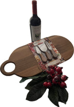 Load image into Gallery viewer, Our rounded handled and charcuterie board comes with 2 cheese knives and a fork to complete this 19.5&quot; x 8.5&quot; board.