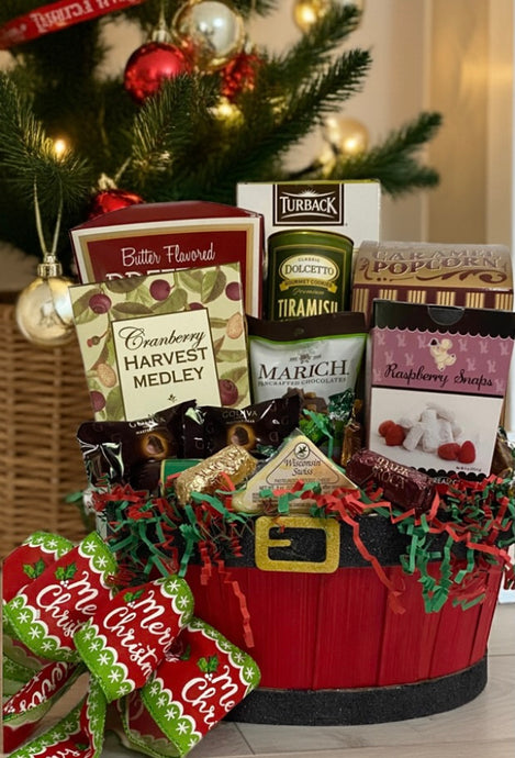Oh, jingle bells, jingle bells! Check out our Santa Belly Basket - it's not just any basket, it's the cutest, most festive treat-filled delight you'll ever find! Packed to the brim with delightful goodies that are sure to bring joy to everyone, it's the perfect merry mix for sharing by the fireside, entertaining guests, or simply letting someone special know they're in your thoughts! What's nestled in this ho-ho-whole lot of fun, you ask? Let me spill the magical treats: Butter Flavored Pretzels, 