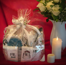 Load image into Gallery viewer, Our &quot;Celebrate Love and New Beginnings&quot; with this beautifully curated laundry gift basket, is perfect for a newly engaged couple, a wedding day surprise, or a housewarming gift. This gift is &quot;All the Rage&quot; with our newlyweds! Thoughtfully designed with both registry essentials and personalized touches, it blends practicality with charm. 