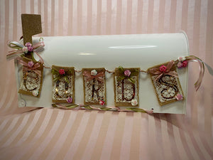 Our Bridal Day Card Mailbox is the perfect card collector for your wedding day! This full-size reusable metal white box is embellished and customized for our couples with their wedding colors. This particular box is decorated with rose gold paint, rose gold vinyl, amore rose and sage colored ribbon and so much more. 