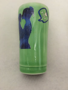 This cup is painted in green ink with blue shadow of mom holding her boy, saying I Love You with a heart in a word bubble. Adorable for any mom!