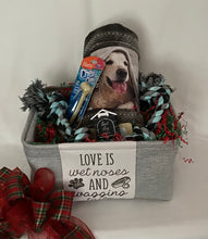 Load image into Gallery viewer, &quot;Love is Wet Noses and Wagging Tails&quot; ~ is the perfect container to fill with some adorable treats for a special pet. This was a custom-made gift for a special Mr. Furry Pants! It contains gifts for a 65lb. fur baby. A plush cuddle blanket, Hartz chew bone, a large rope toy, and an adorable picture holder, and much more! We may substitute items for equal or greater value. If you would like to customize your gift chat with us online. Containers for this gift are subject to availability. 