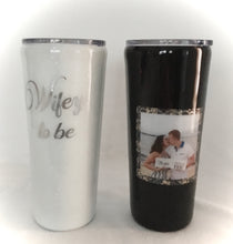 Load image into Gallery viewer, Our Bride &amp; Groom-to-be tumblers make the perfect gift for any future couple. These 20-ounce tumblers will keep their drinks hot/cold for hours. These particular cups are handmade with photos provided by our customer, vinyl, extra fine glitter on the brides&#39; cup, grooms cup hand-painted, and epoxy on both. These cups come with closable lids. We can personalize and design these tumblers any way you like. We can add monograms, names, sayings, etc.