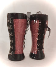 Load image into Gallery viewer, Our Bustier Stein makes the perfect gift for you or someone special. These beer steins are 20 ounces and are stainless steel which holds your drink with A lot of Sass! These steins come with lids. Decorated with an extra-fine rose gold glitter, toggles, ribbon, hook, and eye closures finished with layers of FDA-approved, food-safe epoxy these steins will make the perfect gift. (These two shown in the photo were custom ordered for a birthday gift.)