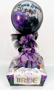 "Until Death Do, Us Part" on one side, and the other had "Love is Brewing" with engagement date and couples names on it in black vinyl this balloon was a big hit! Wrapped in black and purple tulle for a Halloween Engagement party! The balloon stick was wrapped and placed in a large beautiful gift basket the Maid of Honor ordered for the bride. 