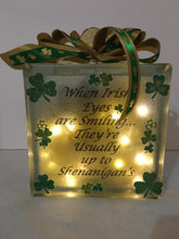 Load image into Gallery viewer, &quot;When Irish Eyes are Smiling...They&#39;re Usually up to Shenanigan&#39;s.&quot;  Our beautiful light block lights up with battery-operated lights. We can customize a saying and add names as well. We can design this block the way you want. It can be a double-sided block that can be placed anywhere or in any room to celebrate Saint Patrick&#39;s Day! See the second picture showing the back of the light blocks.