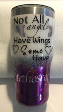 Load image into Gallery viewer, &quot;Not All Angels Have Wings some have Stethoscopes&quot;... This 30-ounce stainless steel tumbler is decorated with super fine metallic glitter, vinyl and metallic vinyl, and resin. This tumbler is great for any hot or cold drink and can hold 30 fluid ounces with a lid. These tumblers can be ready in one to two weeks. We can personalize and customize these tumblers by adding names, dates, etc. We carry several different stainless tumblers in a variety of sizes.