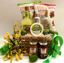 Load image into Gallery viewer, Our Margarita Party-themed basket is all the rage! It&#39;s a FIESTA all in one!  One of our &quot;Best Sellers!&quot; Perfect gift for Cinco de Mayo, for couples, friends, business associates, moms, dads, retirees, or just for a day by the pool! We&#39;ve included a beautiful basket, two large bags of Tortiyahs Superior dipping chips, Margarita Mix, Margaritaville Island Tequila, a Complete shaker kit, Margarita rimming salt, Salsa De Tres Chiles, Mango Pineapple Salsa, and so much more!