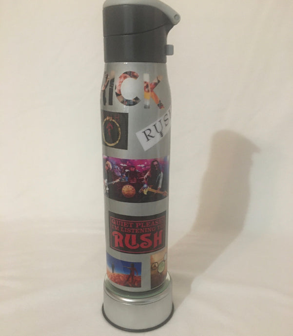 Rush tumbler is a stainless steel tumbler that can hold your drink hot or cold for hours. It is approximately 24 ounces and a perfect gift for your RUSH fan. This Built tumbler is decorated with multiple album covers and customers' name cut out of a photo. We carry several different stainless tumblers in a variety of sizes. 