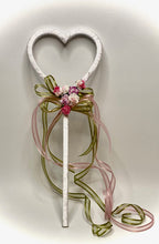 Load image into Gallery viewer, These handmade flower girl wands are so adorable! These wands are a solid one-piece 3D printed heart wrapped with white ribbon and embellished with amore rose, sage ribbon, and mini rosettes. Approximately 12&quot; long by 4&quot; wide. We can ship these wands nationwide.